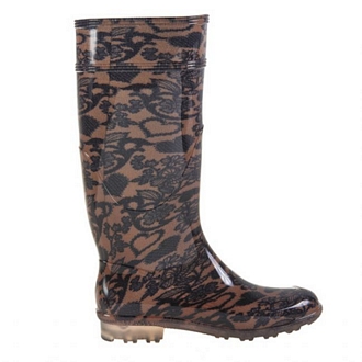 Womens knee-high rain boots with printed stocking-like effect and transparent tractor sole