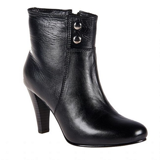 Woman’s leather ankle boots with high heels